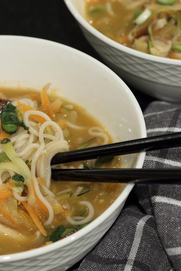 Healthy Ramen Noodles recipe in a white bowl with chopsticks
