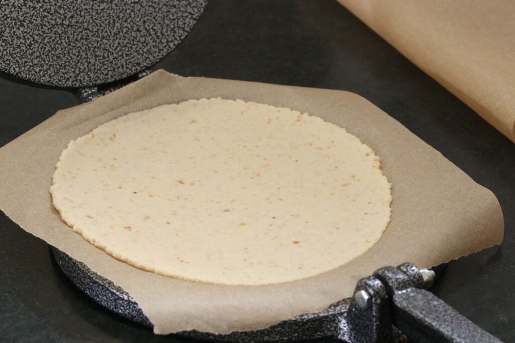 Cassava flour tortilla formed using a tortilla press