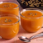 Three glass soup cups of Butternut Squash Soup