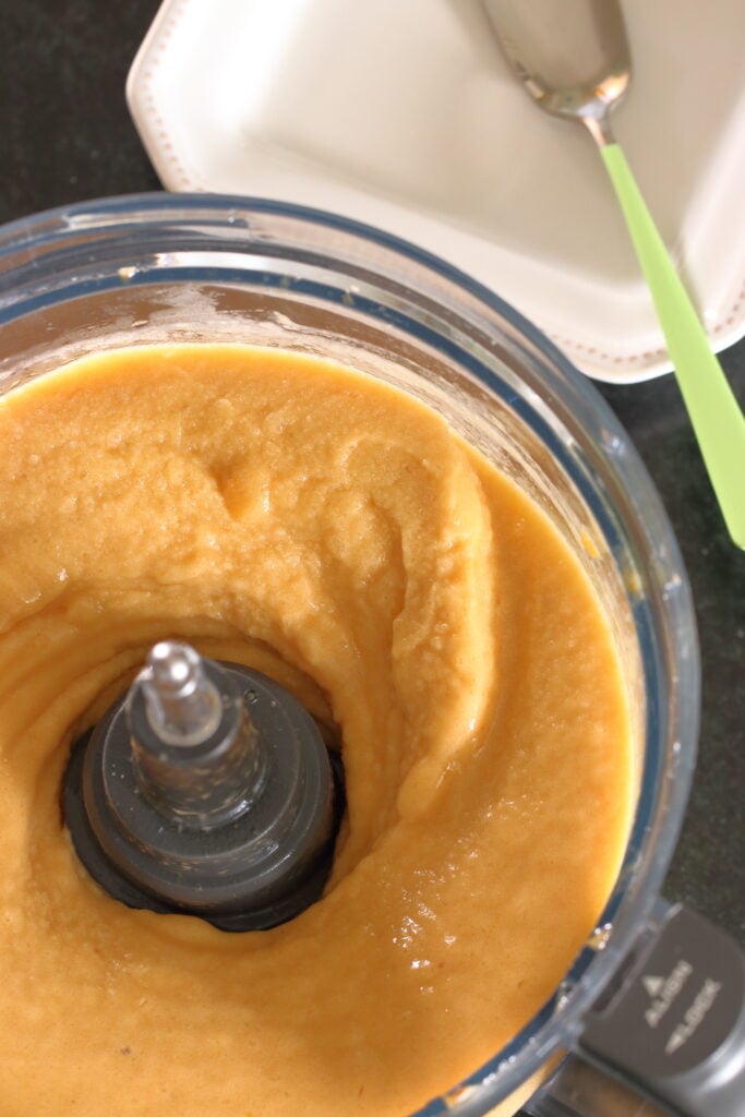Frozen peaches blended in food processor with frozen banana and a splash of honey simple syrup ready to serve