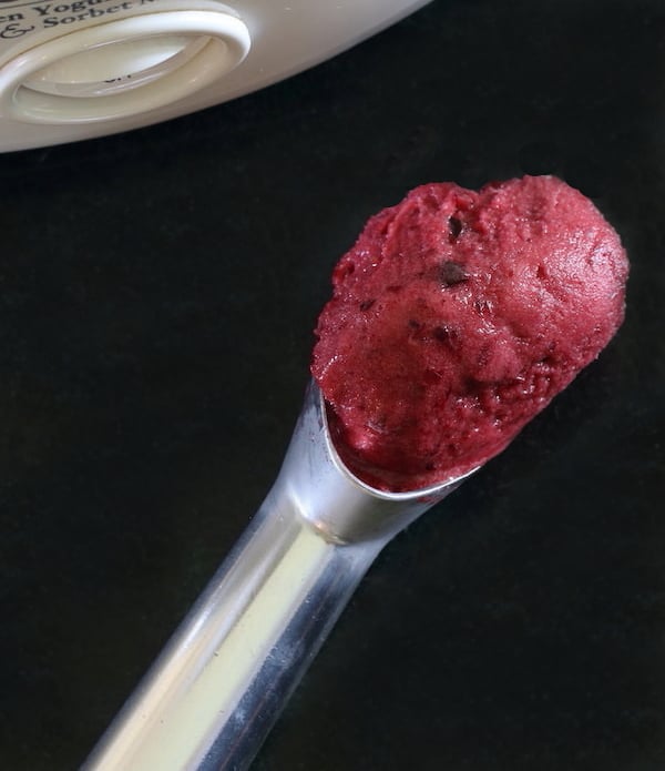 Scoop of cherry hibiscus dairy-free sorbet
