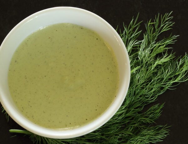 Cashew Dill dressing with sprigs of dill