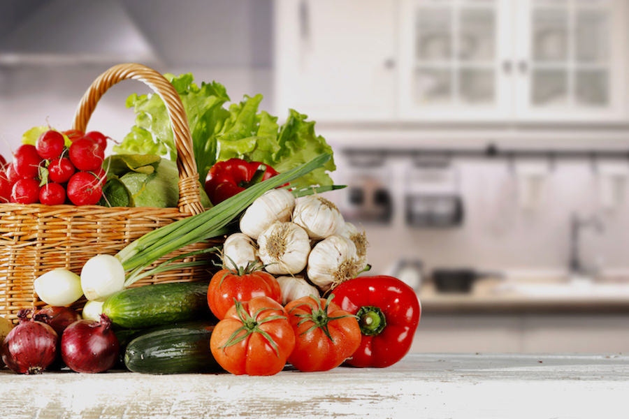 Display of vegetables in white kitchen