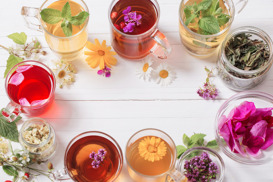 Variety of Teas in clear mugs