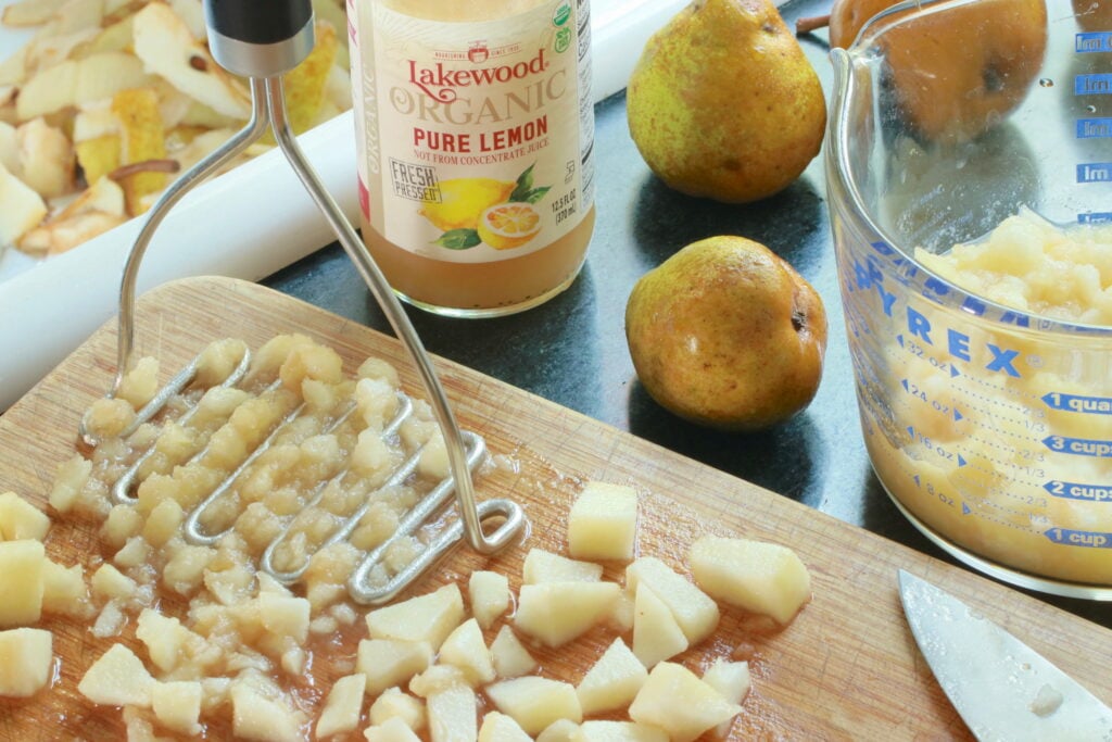 Peeling, coring, cutting, and mashing pears for pear jam recipe