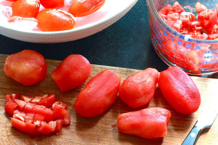Removing tomato skins and dicing the tomatoes for making Salsa Roma