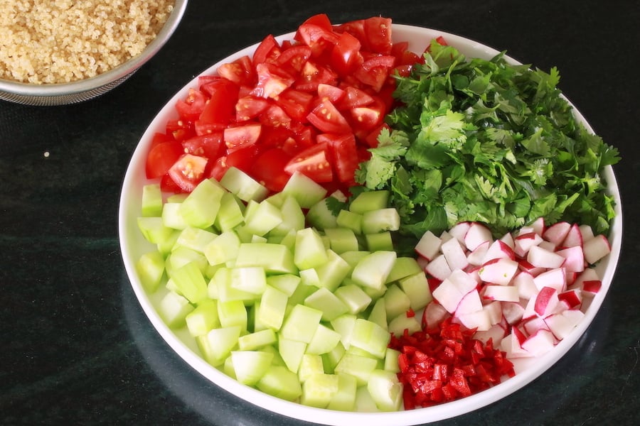 Zesty Quinoa Salad ingredients on a plate before combining with quinoa