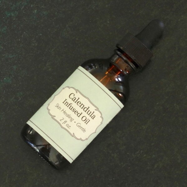 View of label on 2 oz bottle of calendula infused oil